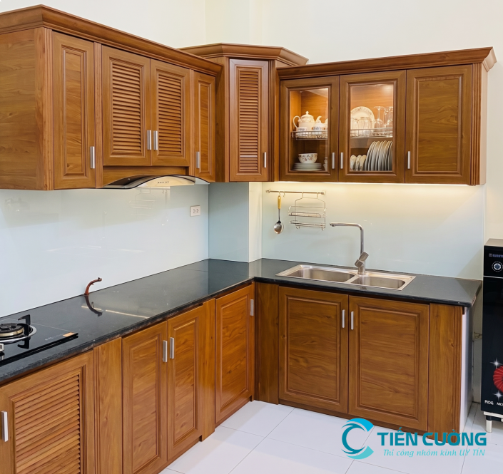 Tủ bếp nhôm kính vân gỗ chữ L đẹp