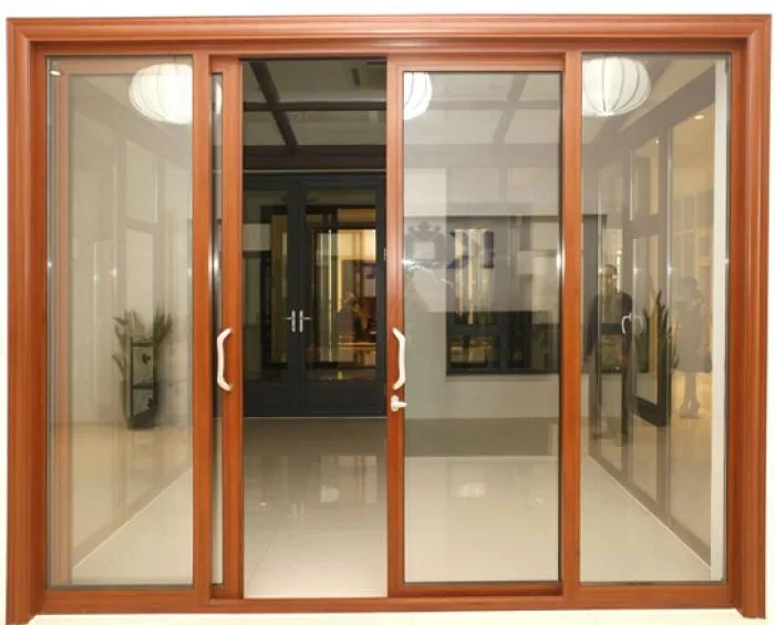 Cửa Nhôm Kính Giả Gỗ | Sang Trọng Bền Đẹp Giá Tốt Tại TPHCM - hình ảnh thực tế Cửa nhôm kính giả gỗ màu óc chó đẹp sang trọng